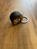 Mini Racing Tyre Keychain – Perfect for Motorsport Fans